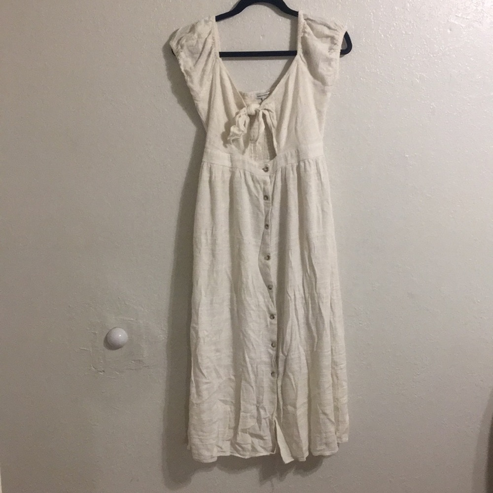 Stunning white button up dress with tie in front
